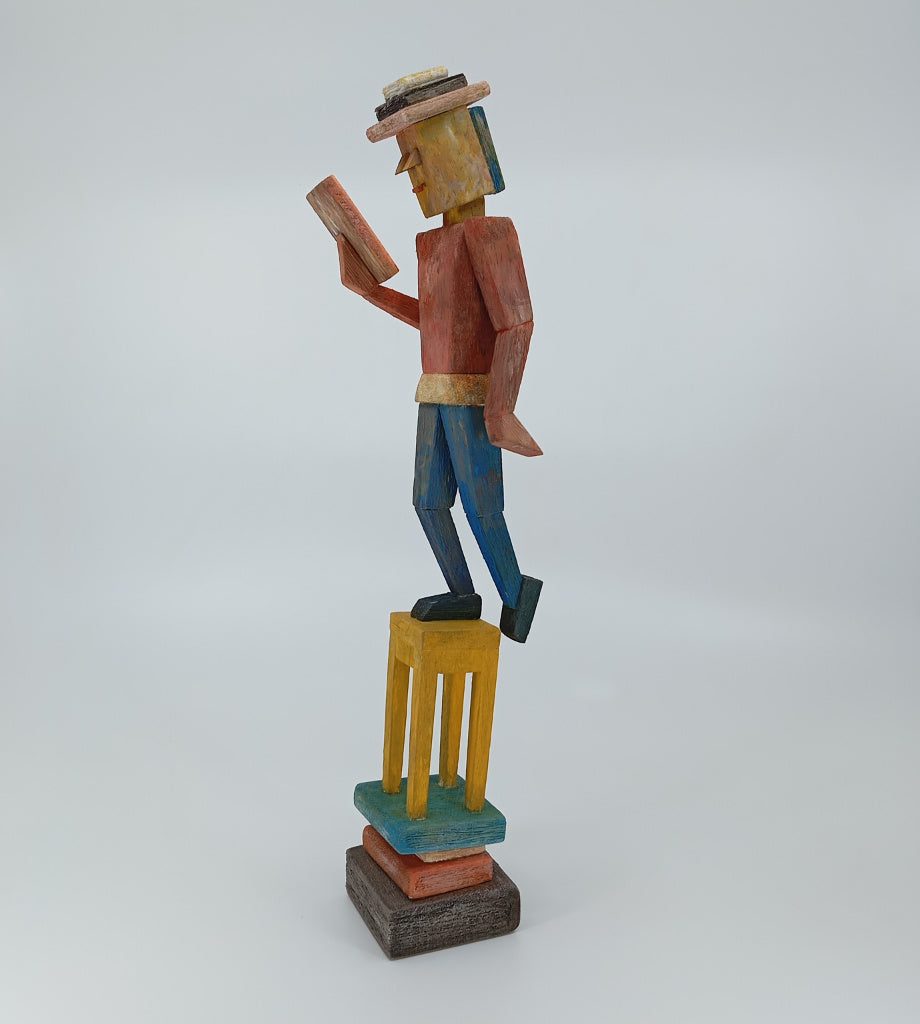 The Reader in Balance Wood Sculpture